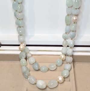Tumbled opaque aquamarine and baroque pearl necklace with white zircon accents.